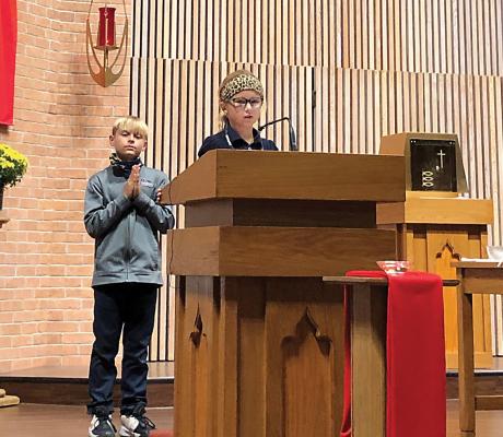 01-24-2021-CSW-p2-3-child-reading-at-Mass