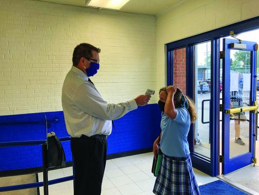 08-23-2020-return-to-school---bethalto-principal-checks-temps