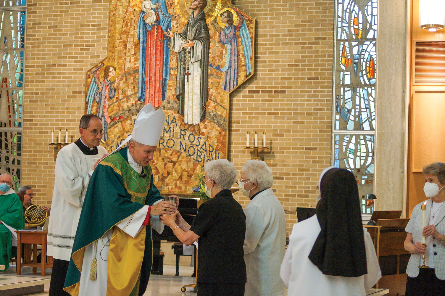 09 04 2022 Dominican 150th paprocki accepts gifts